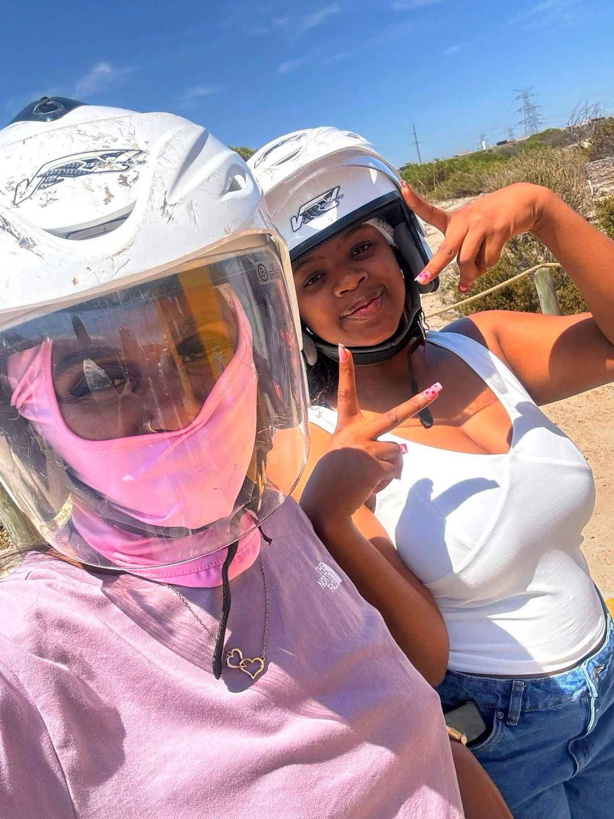 Quad biking selfie with helmets